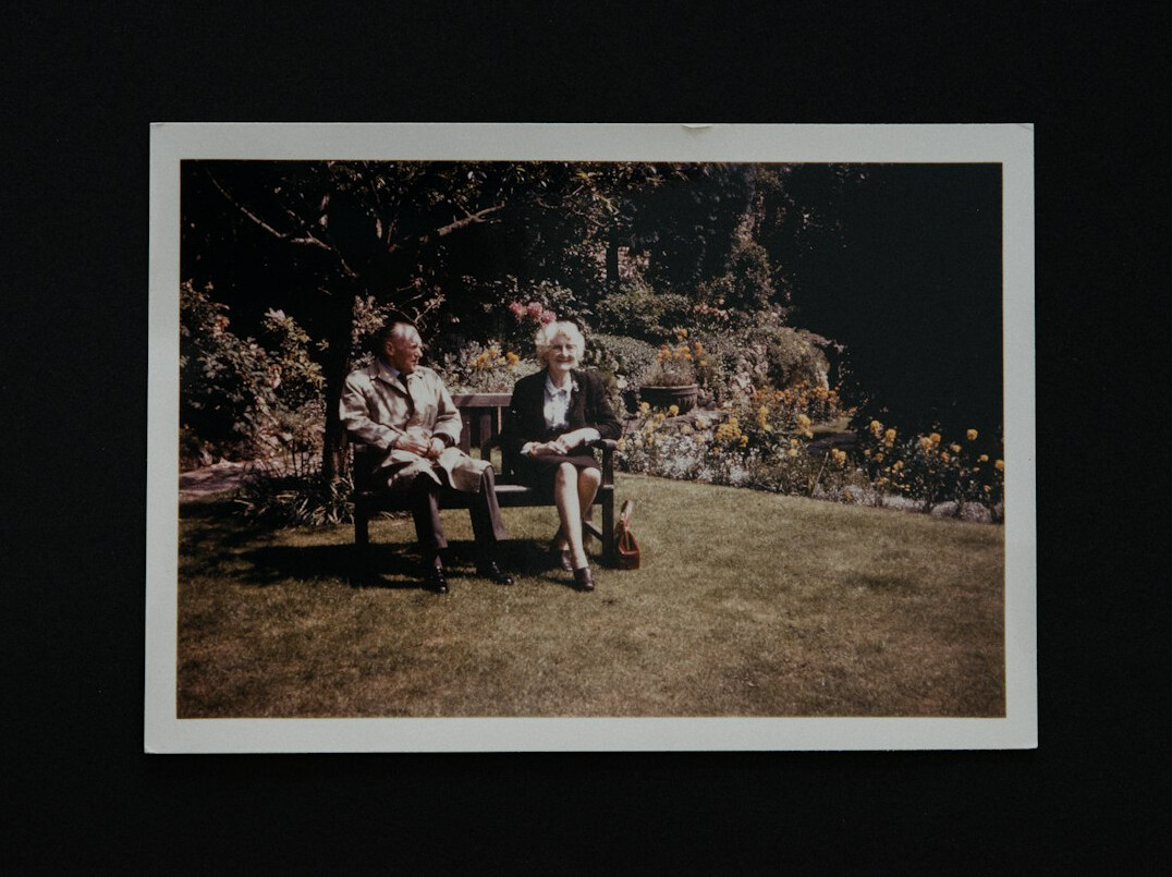 senior people chatting in garden