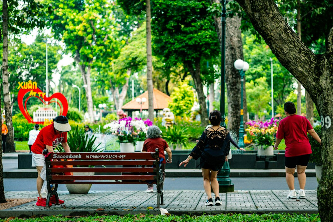 Elderly people gardening together in a community garden