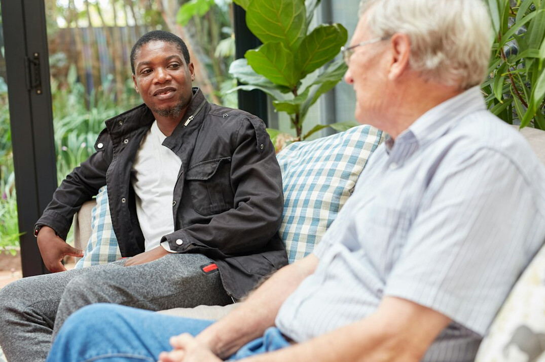elderly neighbors talking